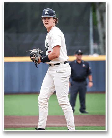 A baseball player in a white uniform stands on the field, holding a baseball glove. AI generated content