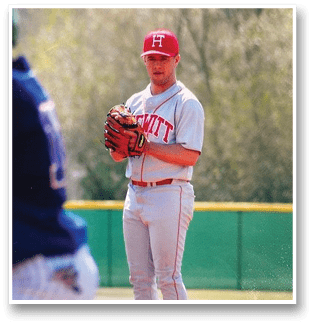A baseball player wearing a red hat and white uniform is holding a baseball glove. AI generated content