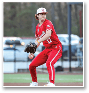 A baseball player in a red uniform is on the mound, preparing to throw the ball. AI generated content
