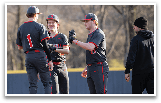 Three baseball players wearing grey uniforms are standing on a field, shaking hands and congratulating each other. AI generated content