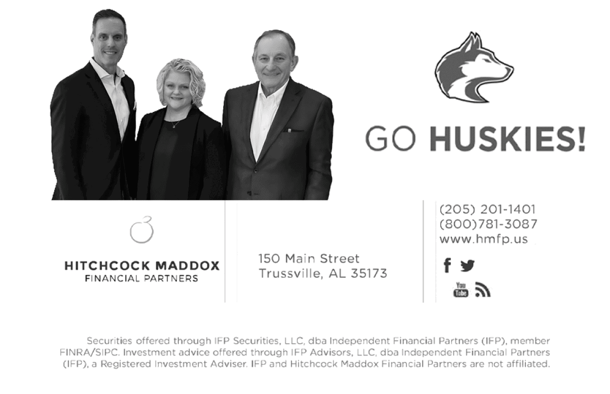 Three people pose for a photo in front of a sign that says Go Huskies. AI generated content