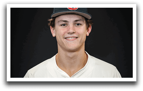 A young man wearing a baseball uniform and a black hat with the letter T on it. AI generated content