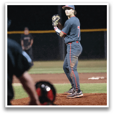 A baseball player is on the mound, holding a baseball glove and preparing to throw the ball. AI generated content