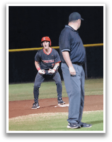 A baseball player is standing on the field, holding a baseball bat, and waiting for the pitch. The umpire is also present, observing the game. AI generated content