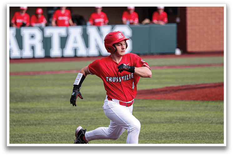 A baseball player wearing a red shirt and a helmet is running on the field. AI generated content