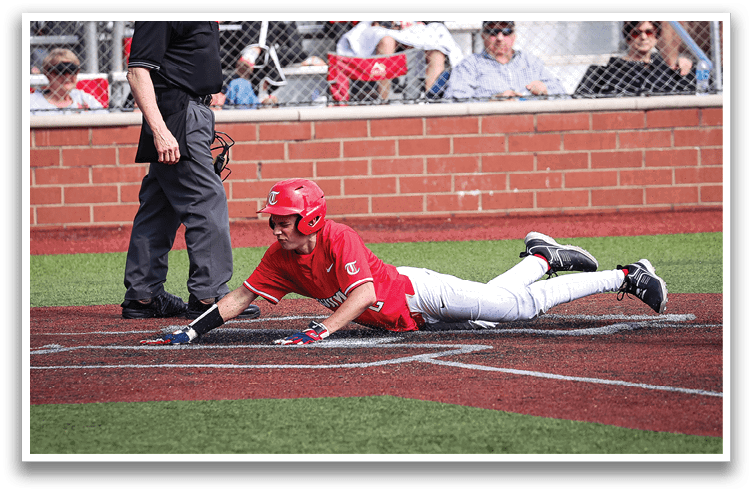 A baseball player slides into home plate, trying to avoid being tagged out. AI generated content