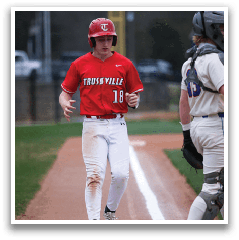 A baseball player in a red shirt and white pants is running towards home plate. AI generated content