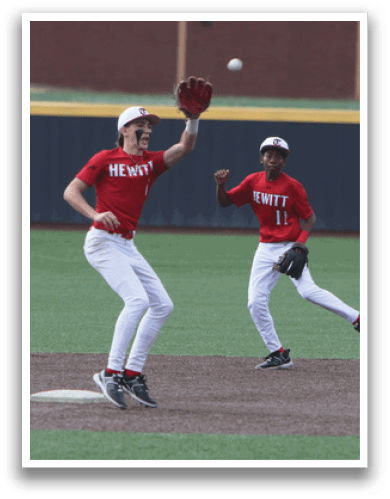A baseball player catches a ball while another player slides into the base. AI generated content