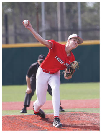 A baseball player in a red shirt and white pants is throwing a ball on a field. AI generated content