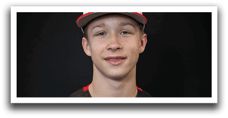 A young man wearing a baseball uniform with the word “Uskies" on the front. AI generated content