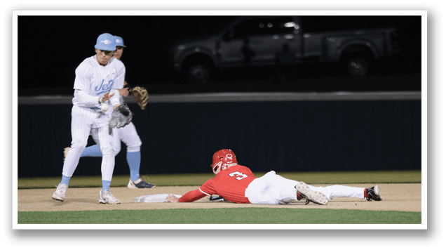 A baseball player slides into home plate while another player tries to catch the ball. AI generated content