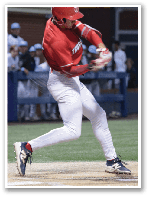 A baseball player in a red shirt and white pants is swinging a bat, attempting to hit a ball. AI generated content