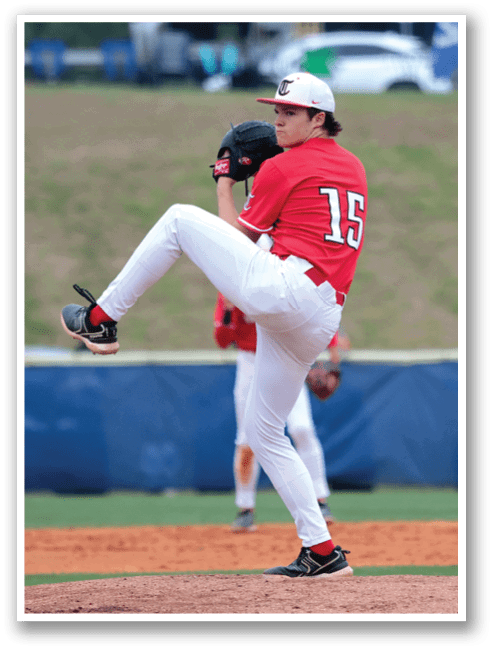 A baseball player in a red shirt and white pants is pitching a ball. AI generated content