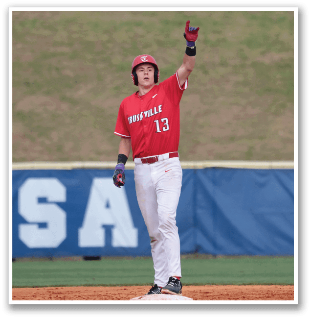 A baseball player wearing a red and white uniform stands on a base, holding his arms up in the air. AI generated content