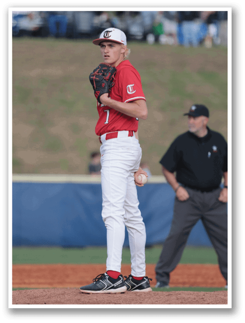 A baseball player in a red shirt and white pants is standing on the pitcher's mound, holding a baseball in his hand. AI generated content