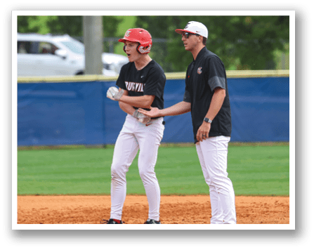 Two baseball players on the field, one holding a bat and the other holding a glove. AI generated content