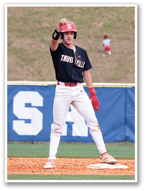A baseball player in a black shirt and white pants is standing on the field, holding his glove up in the air. AI generated content