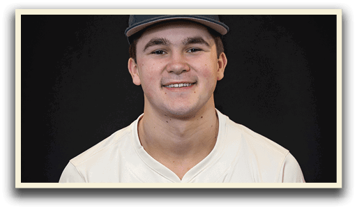 A young man wearing a baseball uniform and a cap with the letter T on it. AI generated content