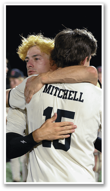 Two baseball players hugging each other on the field. AI generated content