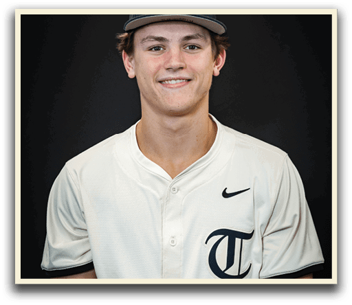 A young man wearing a baseball uniform with the number 2 on the back poses for a picture. AI generated content