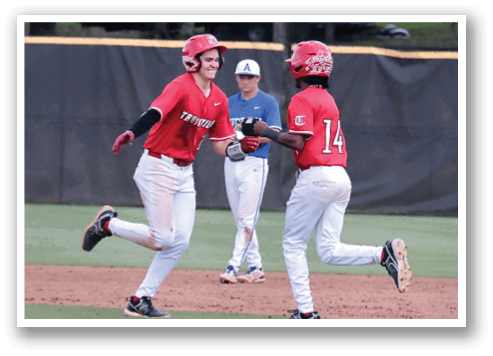 Two baseball players are running on the field, celebrating a successful play. AI generated content