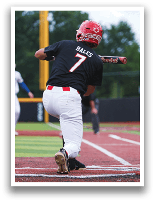 A baseball player in a black shirt and red hat is swinging a bat at a ball. AI generated content