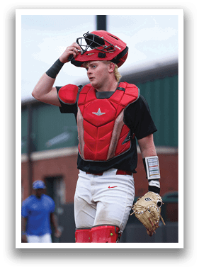 A man wearing a baseball helmet and red chest protector. AI generated content