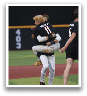 Two baseball players celebrating with a hug on the field. AI generated content