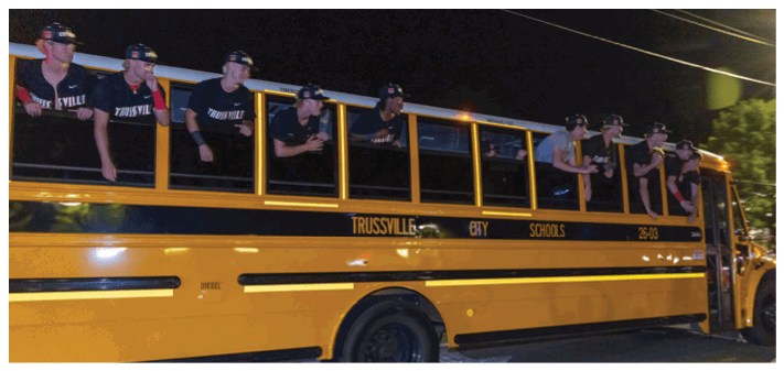 A group of people are riding on the back of a yellow bus. AI generated content