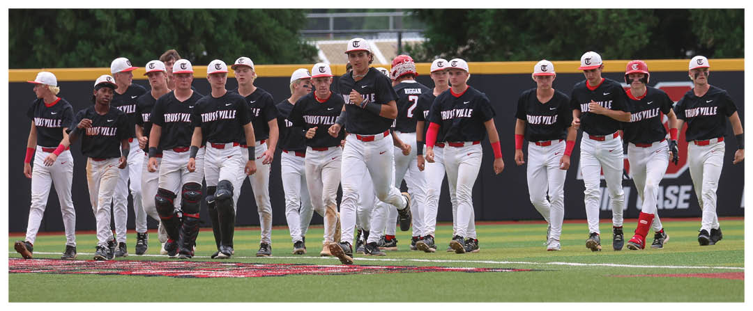 A group of baseball players wearing black shirts and red caps are walking across a field. AI generated content