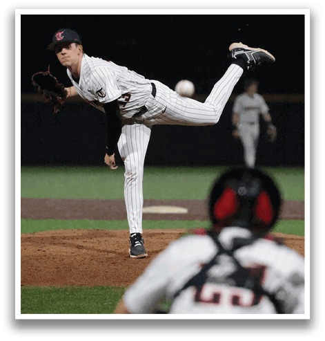 A baseball player is in the middle of a pitch, with his leg in the air. AI generated content