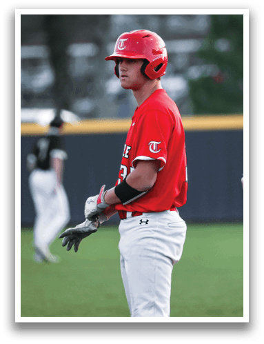 A baseball player wearing a red jersey stands on a field with a coach. AI generated content