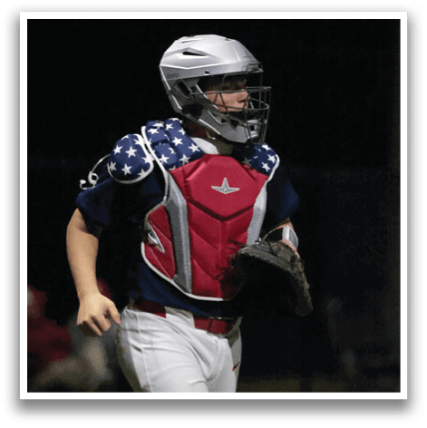 A baseball player in a blue and red uniform is running on the field. AI generated content