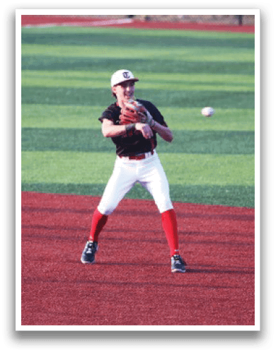A baseball player in a black shirt and white pants is preparing to catch a ball. AI generated content