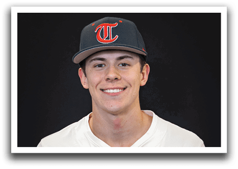 A young man wearing a baseball uniform and a blue hat. AI generated content