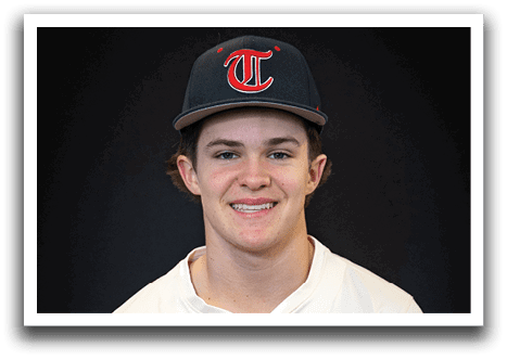 A young man wearing a baseball uniform and a hat with the letter T on it. AI generated content