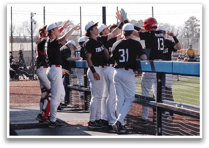 Baseball players in uniforms on a field, some of them are holding up their hands. AI generated content