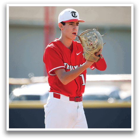 A baseball player in a red and white uniform is holding a catcher's mitt. AI generated content