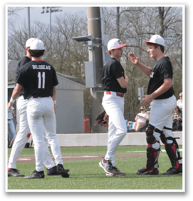 Three baseball players wearing black and white uniforms are standing on a field. AI generated content