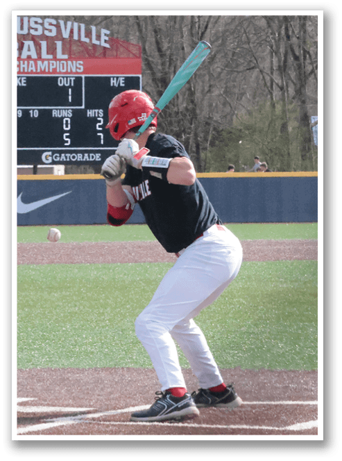 A baseball player is at bat, holding a bat and preparing to swing. The catcher is positioned behind him, ready to catch the ball. AI generated content