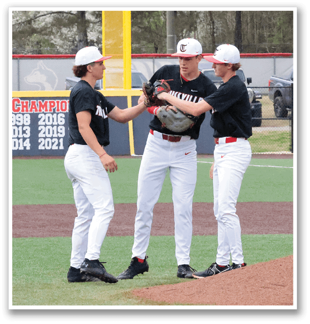 Three baseball players shake hands on the field. AI generated content