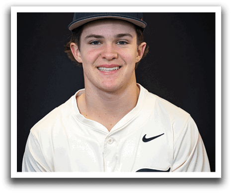 A young man wearing a baseball uniform and a cap with the letter T on it. AI generated content