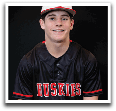 A young man wearing a black and white baseball jersey with the number 7 on it. AI generated content