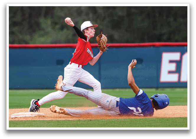 A baseball player slides into a base while another player tries to catch the ball. AI generated content