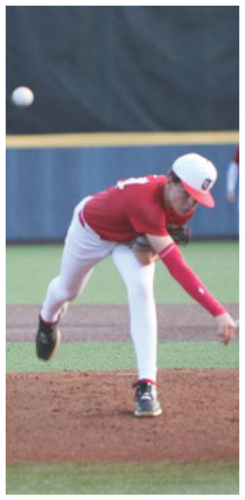 A baseball player in a red shirt is throwing a ball on a field. AI generated content