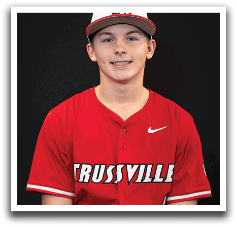 A young man wearing a red baseball jersey with the word “trussville" on the front. AI generated content