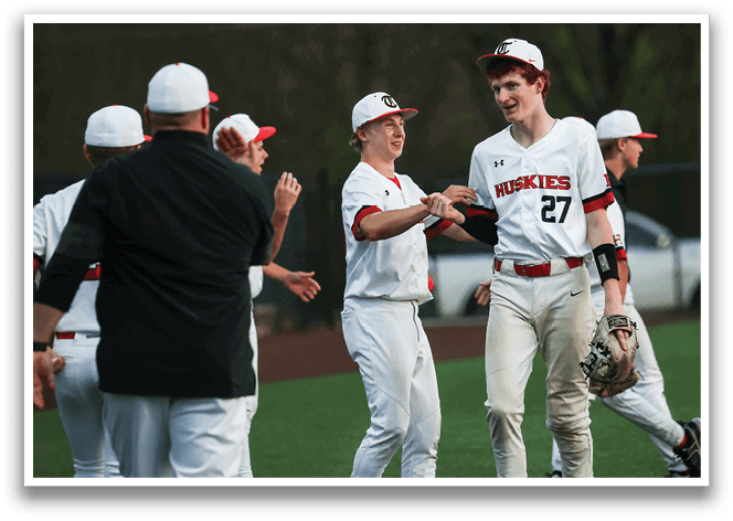 A group of baseball players are on the field, with one player holding a baseball glove. AI generated content
