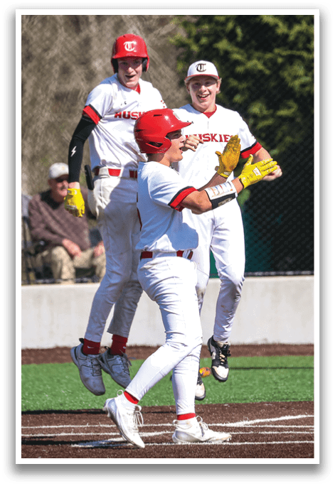 Three baseball players celebrating a hit. AI generated content