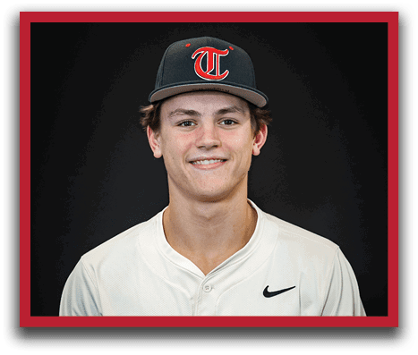 A young man wearing a baseball uniform and a black hat with the letter T on it. AI generated content