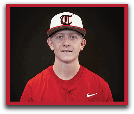A young man wearing a red baseball jersey with the word Trussville on the front. AI generated content